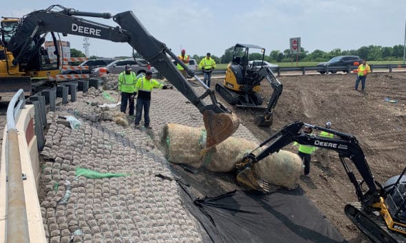 Construction crew working on the road median